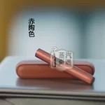 IQOS ILUMA I側開版 赤陶色 TEREA 煙彈專用 應免清潔無刀片感應感應加熱・觸控螢幕・暫停功能升級 加熱煙主機全家現貨供應